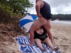 Blowjob on the beach with a very